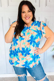Tropical Breeze Turquoise Floral Banded V Neck Flutter Sleeve Top | Daverri Fashions
