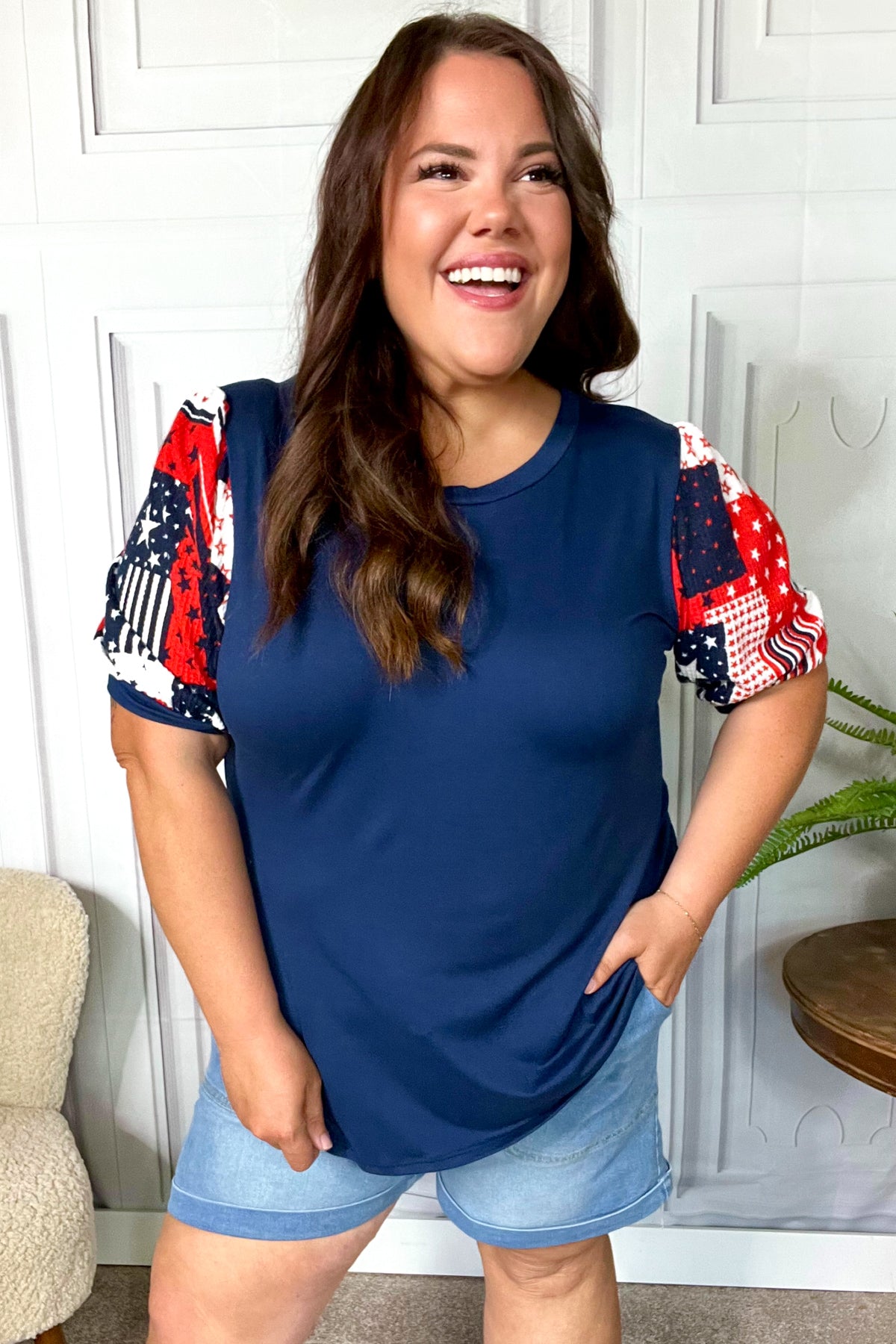 Navy blue top with red white blue patchwork puff sleeves