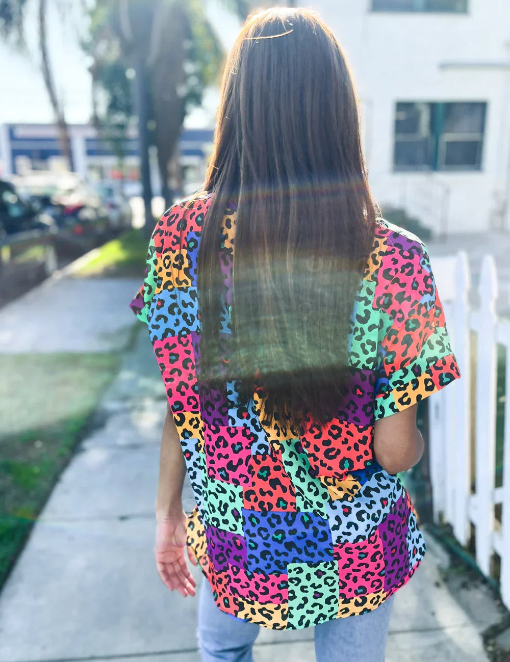 Dazzle in Multicolor Animal Patchwork V Neck Dolman Cap Sleeve Top | Daverri Fashions