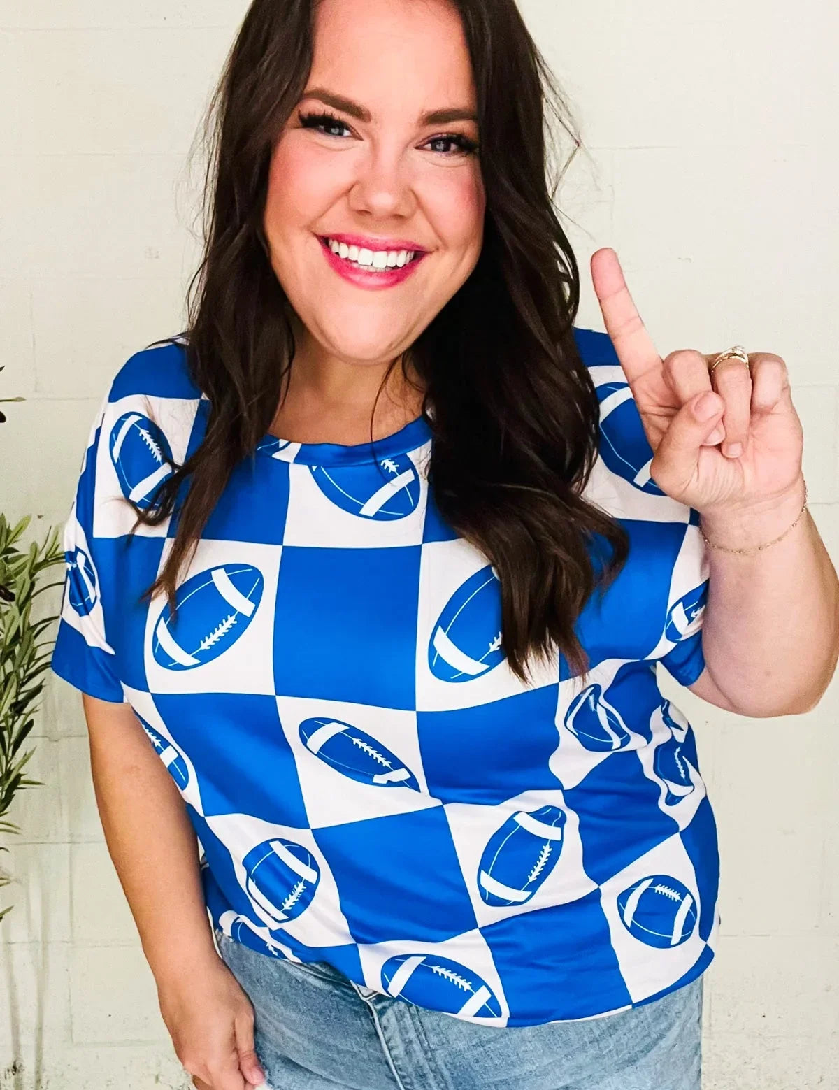Turn Up The Volume Blue Football Checker Print Top | Daverri Fashions