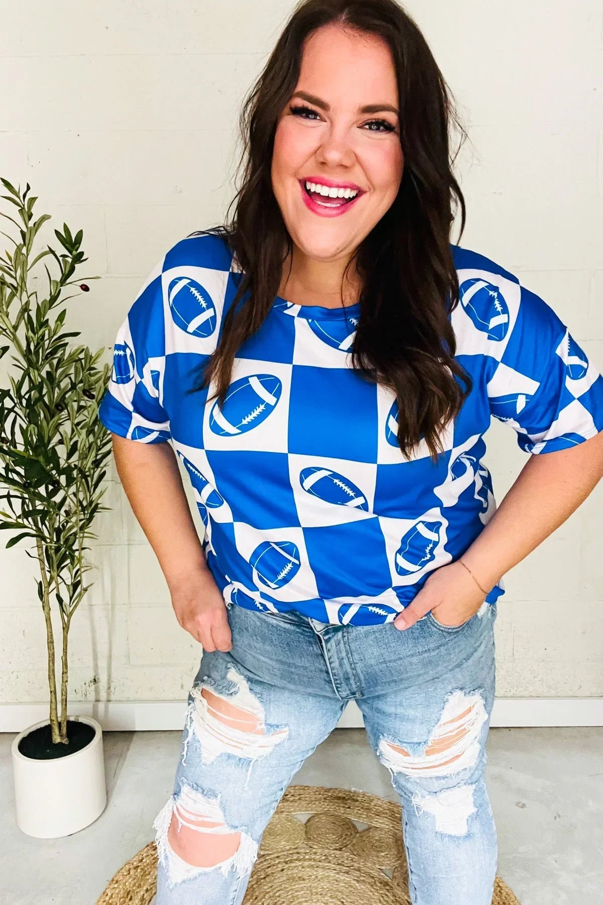 Turn Up The Volume Blue Football Checker Print Top | Daverri Fashions