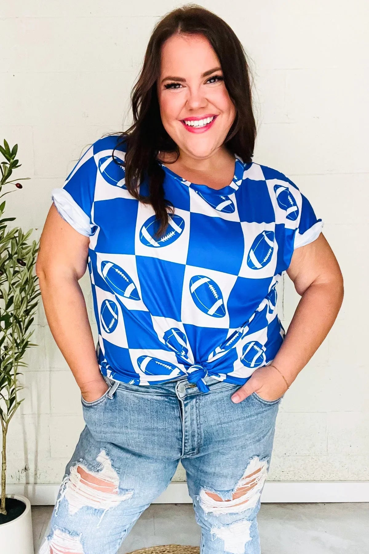 Turn Up The Volume Blue Football Checker Print Top | Daverri Fashions