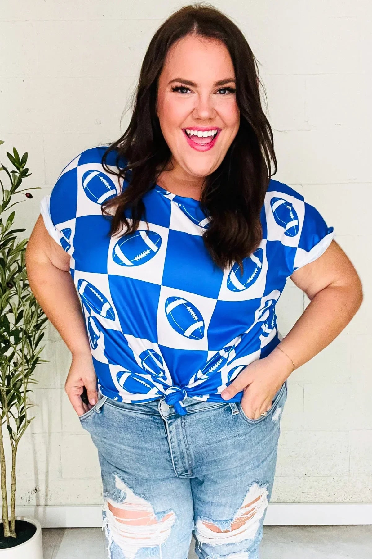 Turn Up The Volume Blue Football Checker Print Top | Daverri Fashions