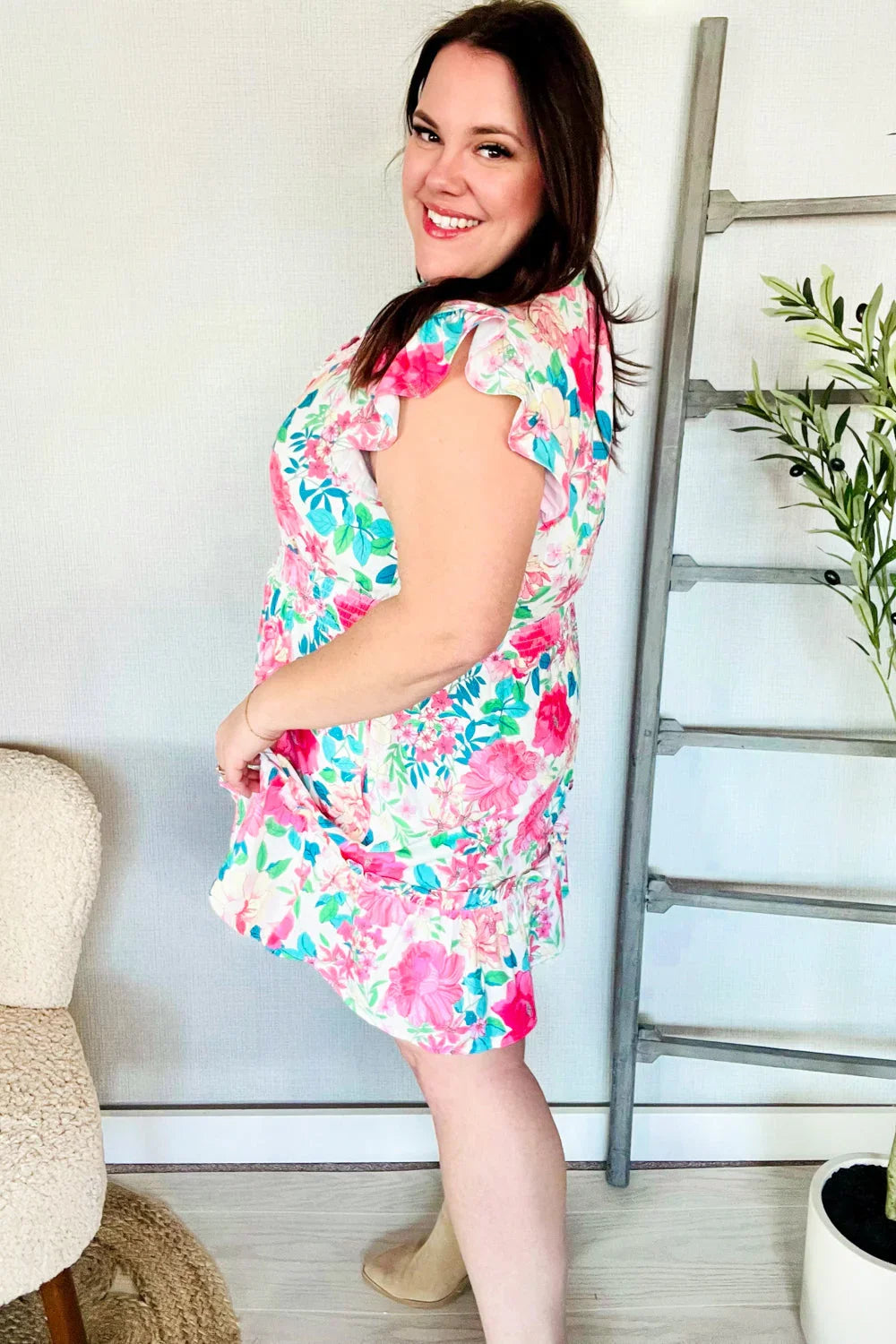 Under Your Spell Floral Smocked Flutter Sleeve Ruffle Mini Dress | Daverri Fashions