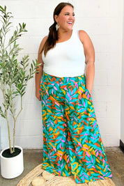 Summer Vibes Green & Orange Abstract Print Smocked Palazzo Pants | 2024 Summer Blow Out Sale Daverri Fashions