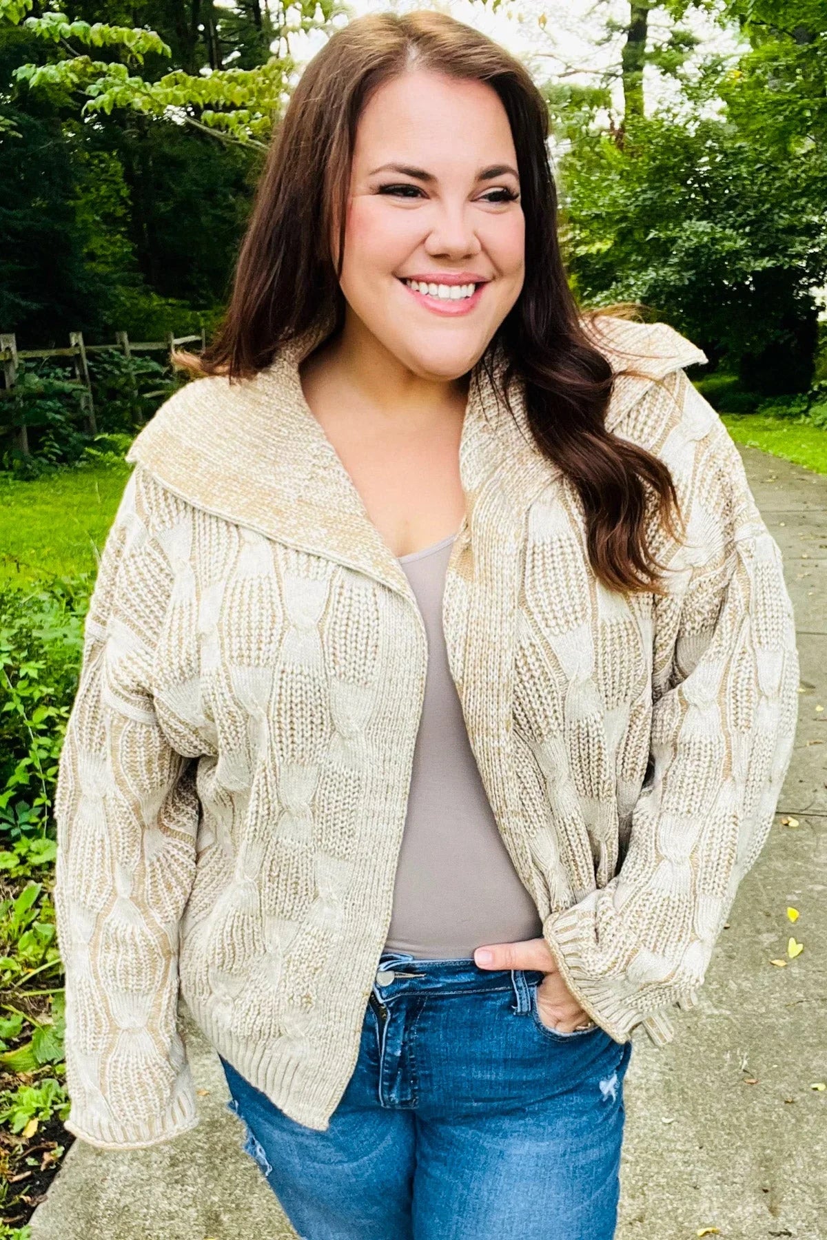 Cream cable knit zip-up taupe cardigan with high collar and pockets