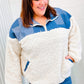 Cream-colored sherpa fleece jacket with blue plaid and corduroy patchwork panels