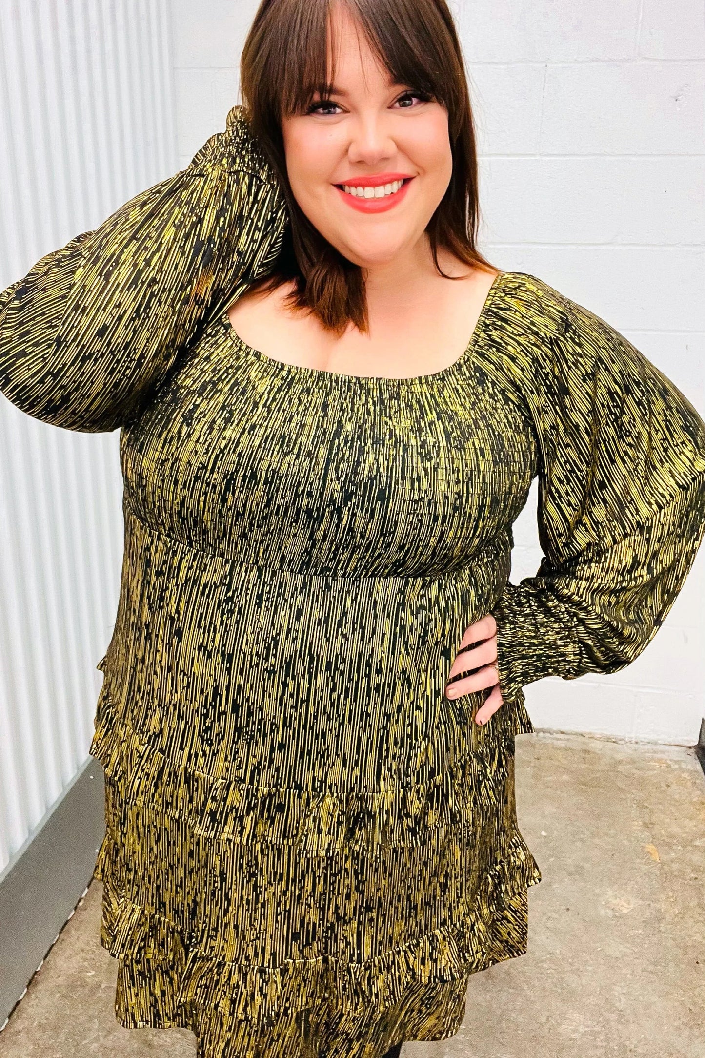 Olive green textured tunic dress with long sleeves and square neckline
