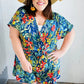 Navy Tropical Floral Surplice Romper - DAVERRI FASHIONS