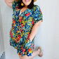 Navy Tropical Floral Surplice Romper - DAVERRI FASHIONS