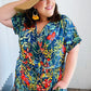Navy Tropical Floral Surplice Romper - DAVERRI FASHIONS