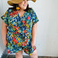 Navy Tropical Floral Surplice Romper - DAVERRI FASHIONS