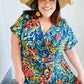 Navy Tropical Floral Surplice Romper - DAVERRI FASHIONS