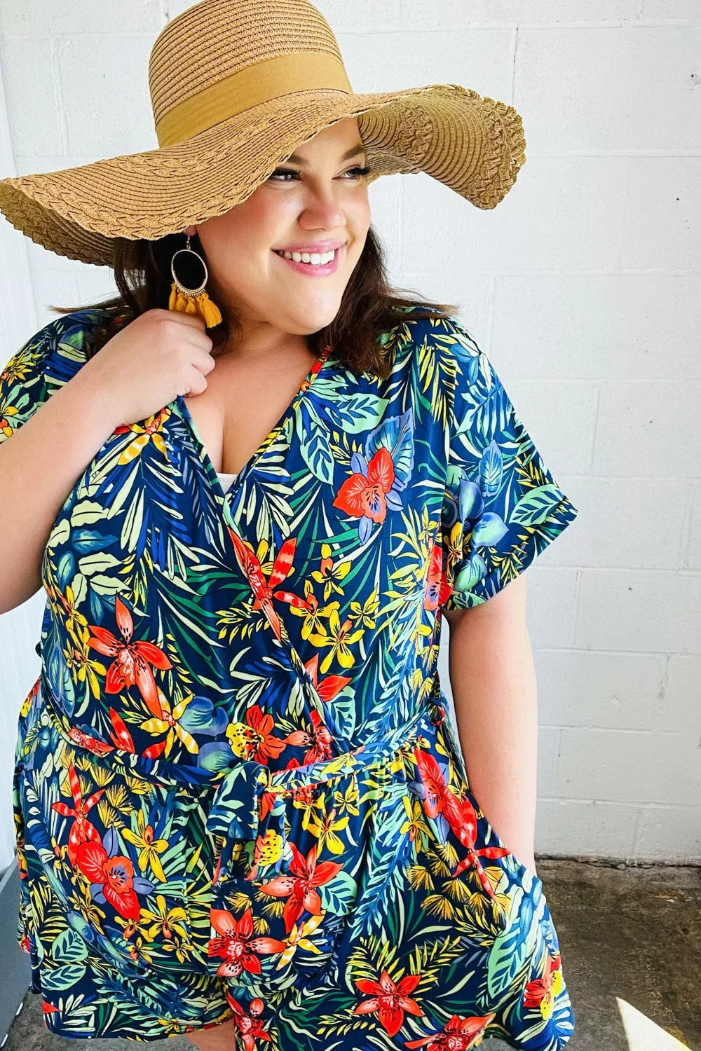 Navy Tropical Floral Surplice Romper - DAVERRI FASHIONS