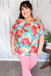 Weekend Ready Aqua & Coral Floral V Neck Woven Top | Daverri Fashions