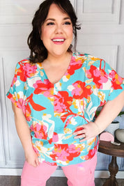 Weekend Ready Aqua & Coral Floral V Neck Woven Top | Daverri Fashions