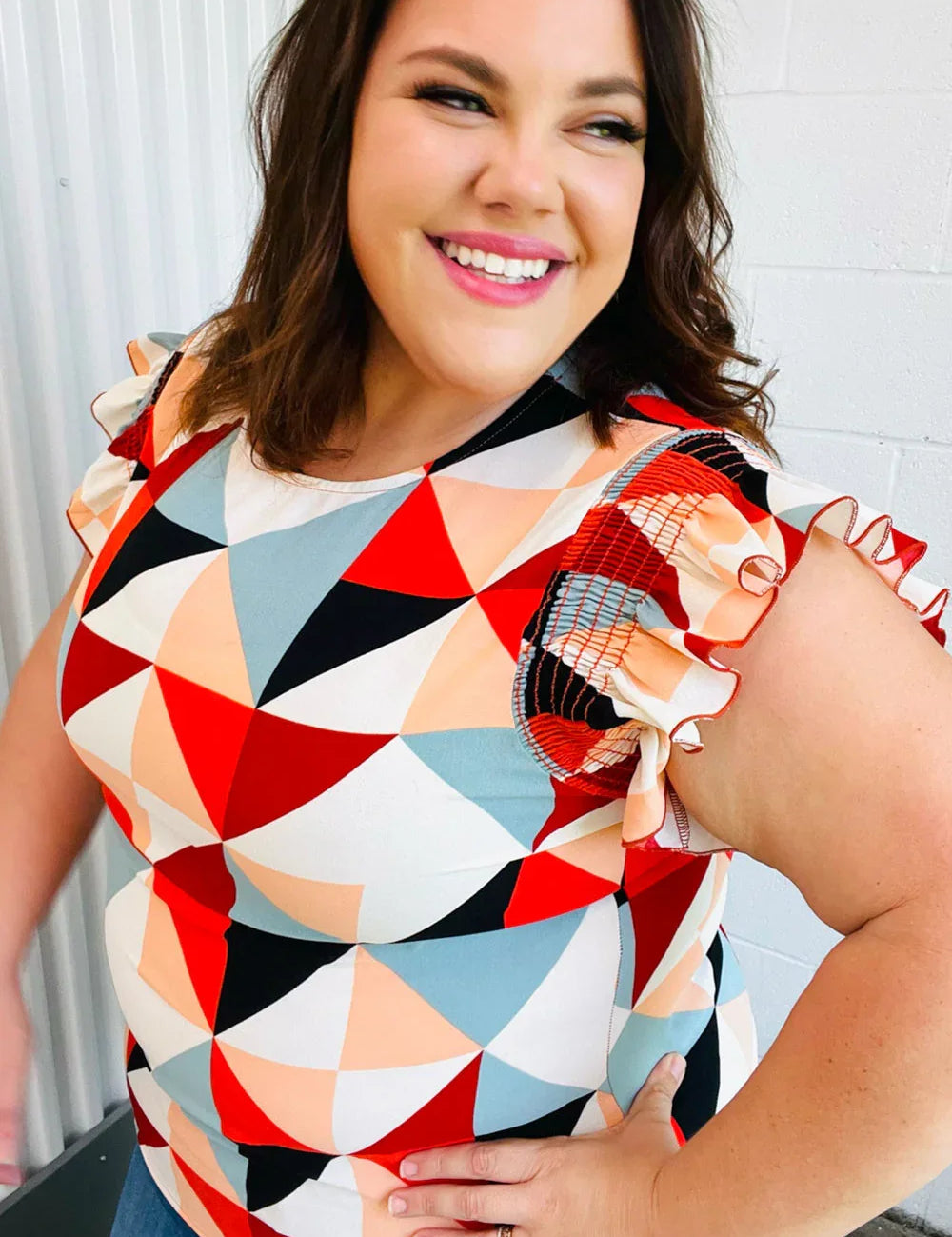 Burnt Orange Geo Print Smocked Ruffle Frill Sleeve Top | Daverri Fashions