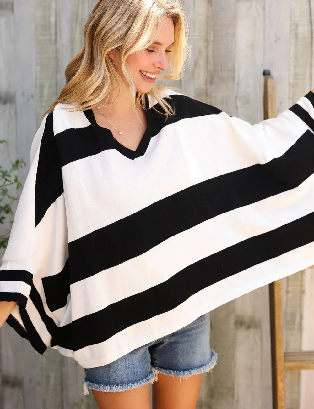 White Stripe Dolman Notch Neck Sweater Poncho | Daverri Fashions