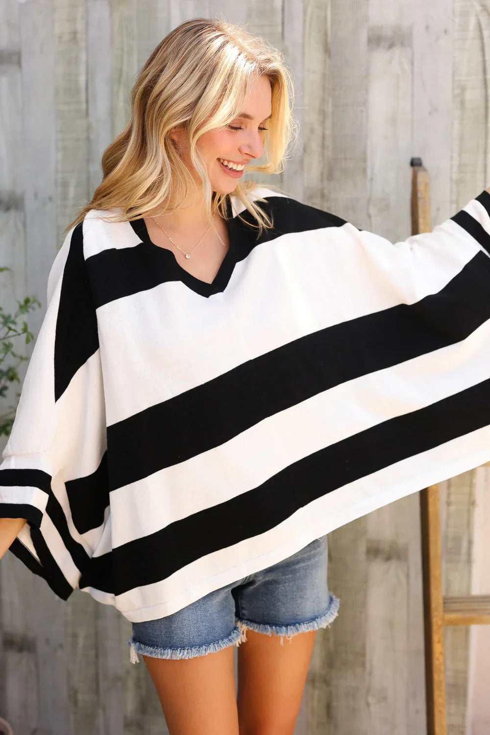 The Traveler Black/White Stripe Dolman Notch Neck Sweater Poncho | Daverri Fashions