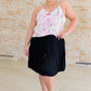 Just a Flirt Pleated Skirt in Black Skirts