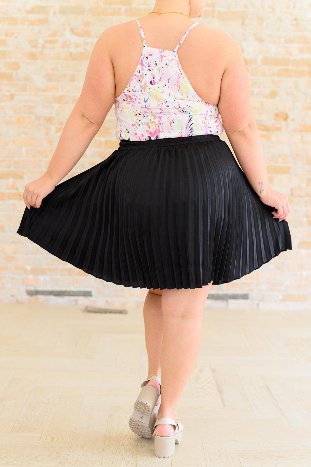 Just a Flirt Pleated Skirt in Black Skirts