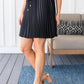 Just a Flirt Pleated Skirt in Black Skirts