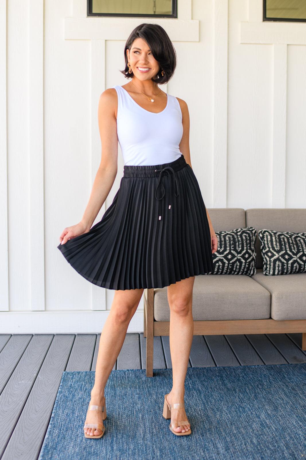 Just a Flirt Pleated Skirt in Black Skirts