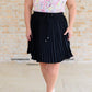 Just a Flirt Pleated Skirt in Black Skirts