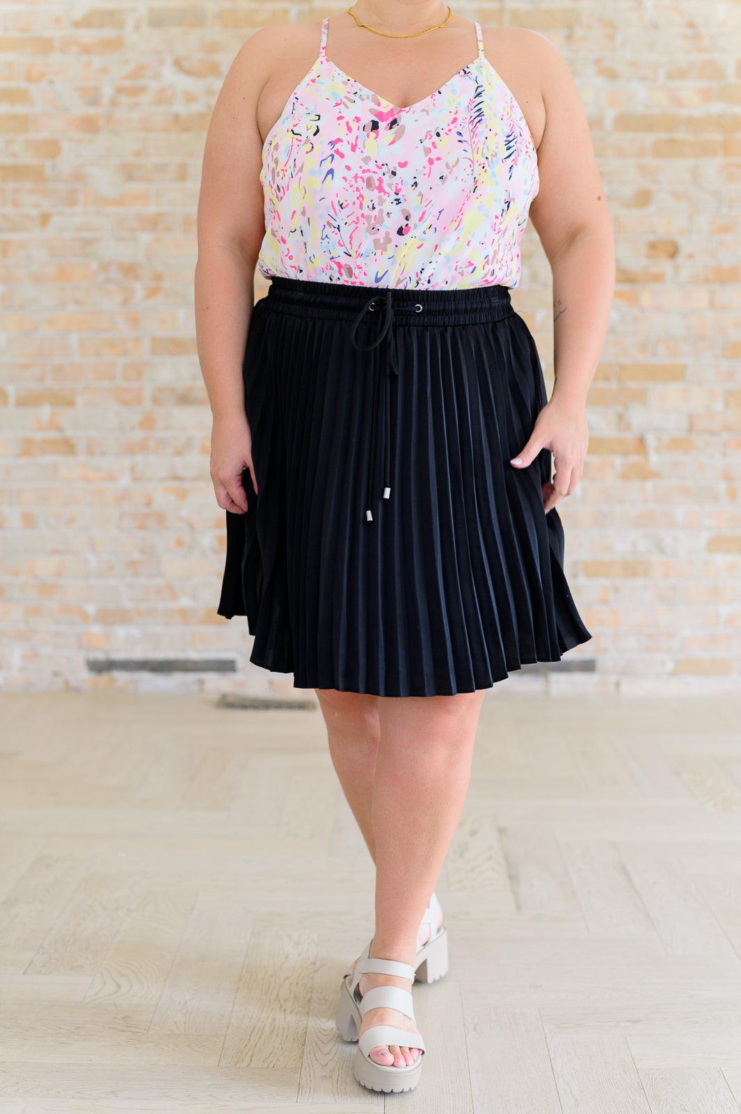 Just a Flirt Pleated Skirt in Black Skirts