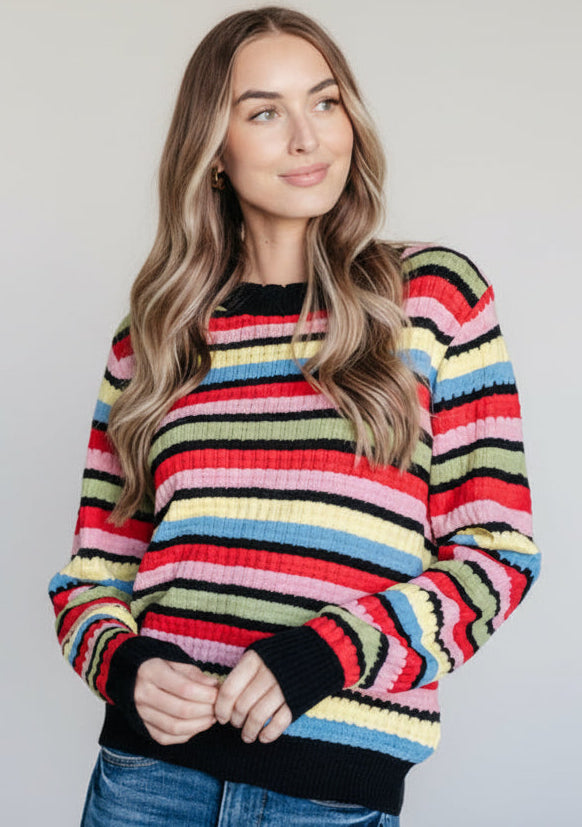 Rainbow-striped knit Keep Dreaming Sweater with black ribbed cuffs and hem