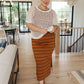 Coastal Dreams cream fishnet top with brown striped knitted skirt