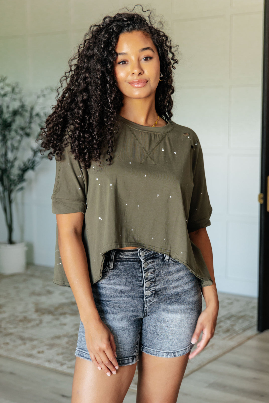 Less Than Stressed Asymmetrical Distressed Top Tops