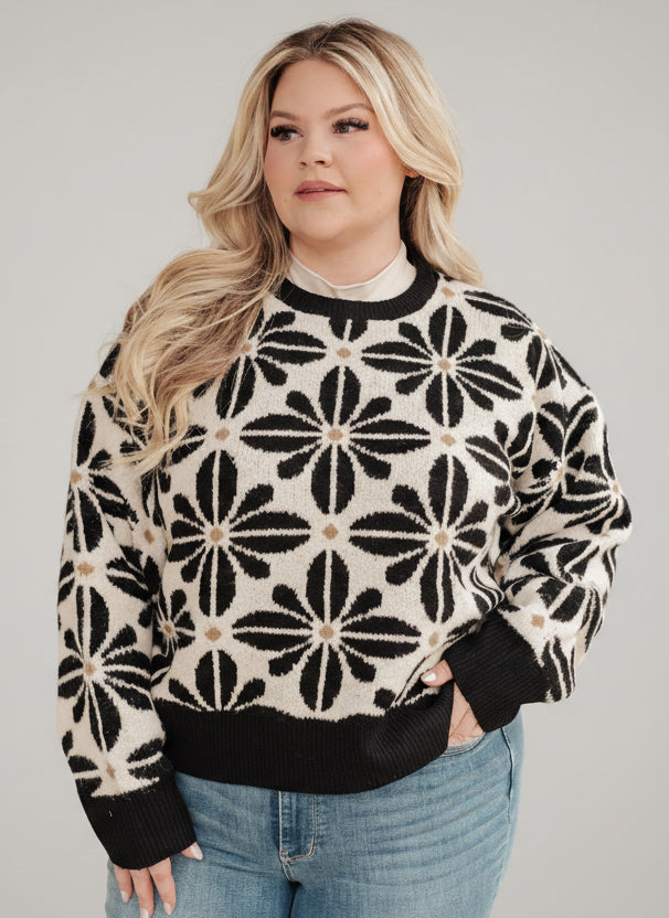 Mid Mod Floral Sweater in black and cream knit with ribbed details