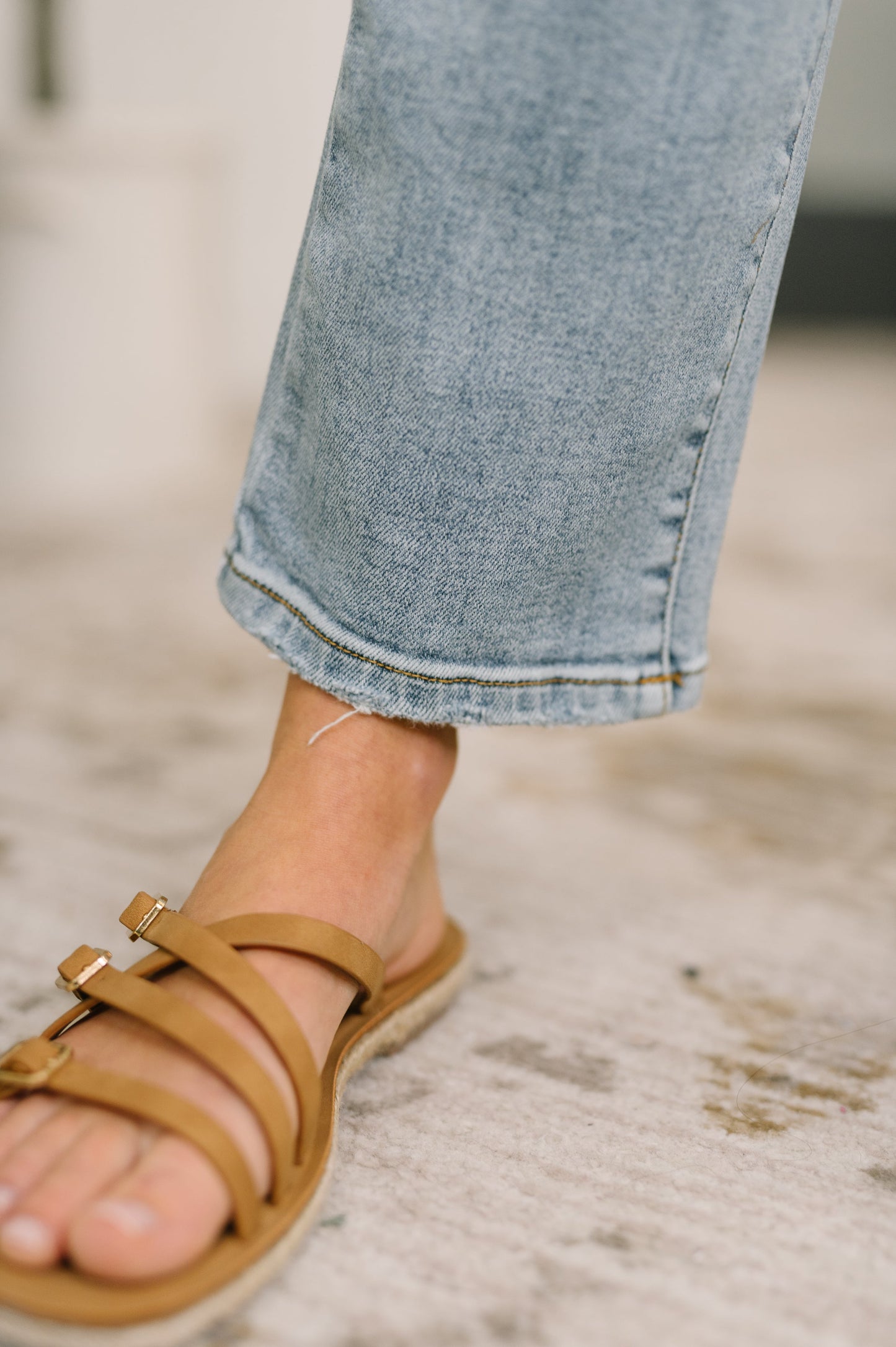Tan leather-strap flat sandals with gold buckles for Natalie pants