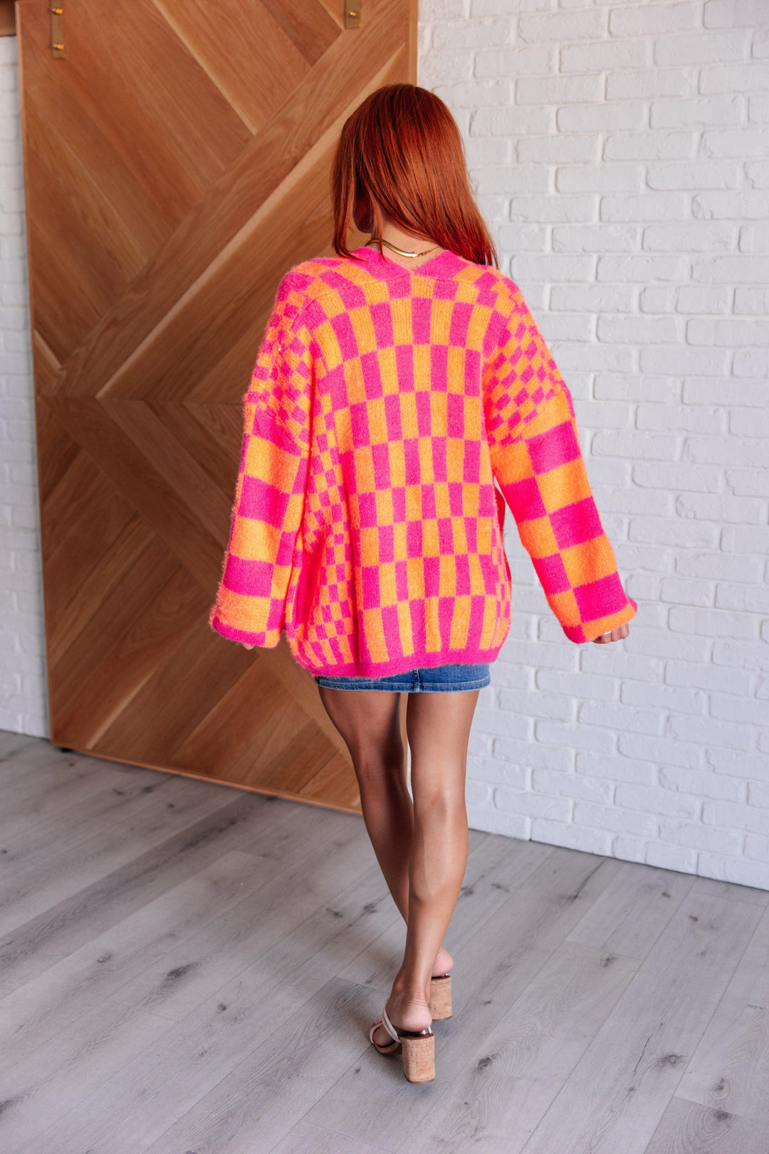 Noticed in Neon Checkered Cardigan in Pink and Orange Layers