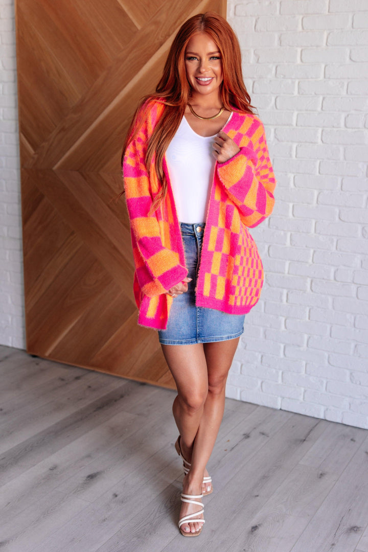 Noticed in Neon Checkered Cardigan in Pink and Orange Layers