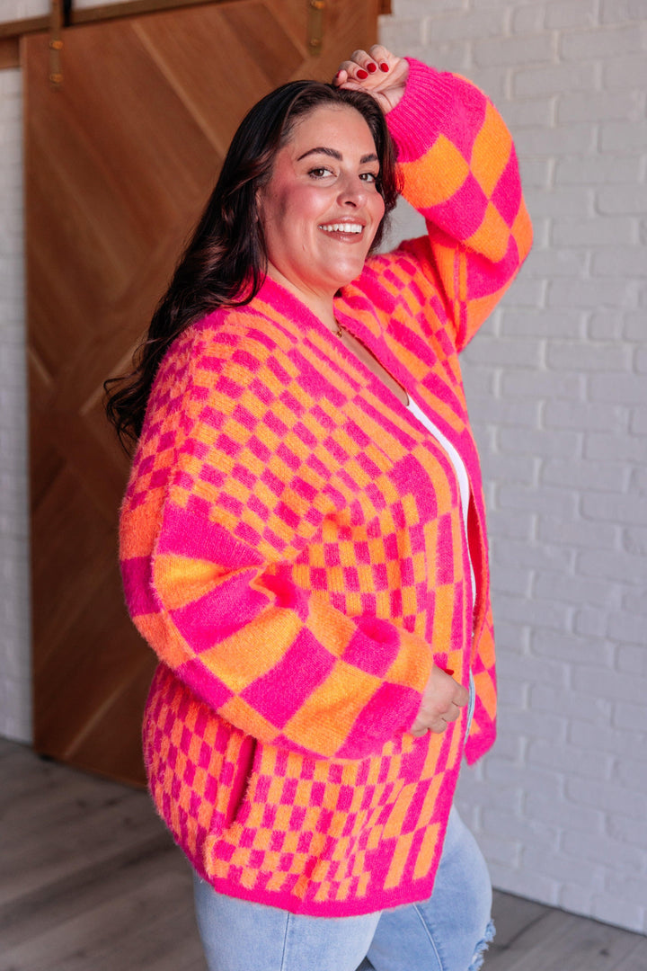 Noticed in Neon Checkered Cardigan in Pink and Orange Layers