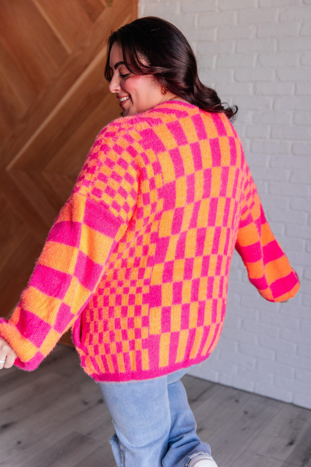 Noticed in Neon Checkered Cardigan in Pink and Orange Layers