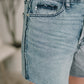 Paige high waist rigid magic cutoff short with light-wash distressed frayed hem