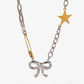 Two-Tone Stainless Steel Bow Star Necklace - DAVERRI FASHIONS
