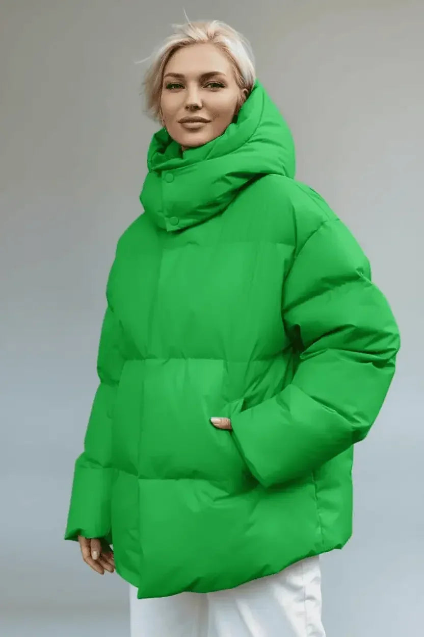 Green pocketed zip-up hooded puffer jacket with quilted design