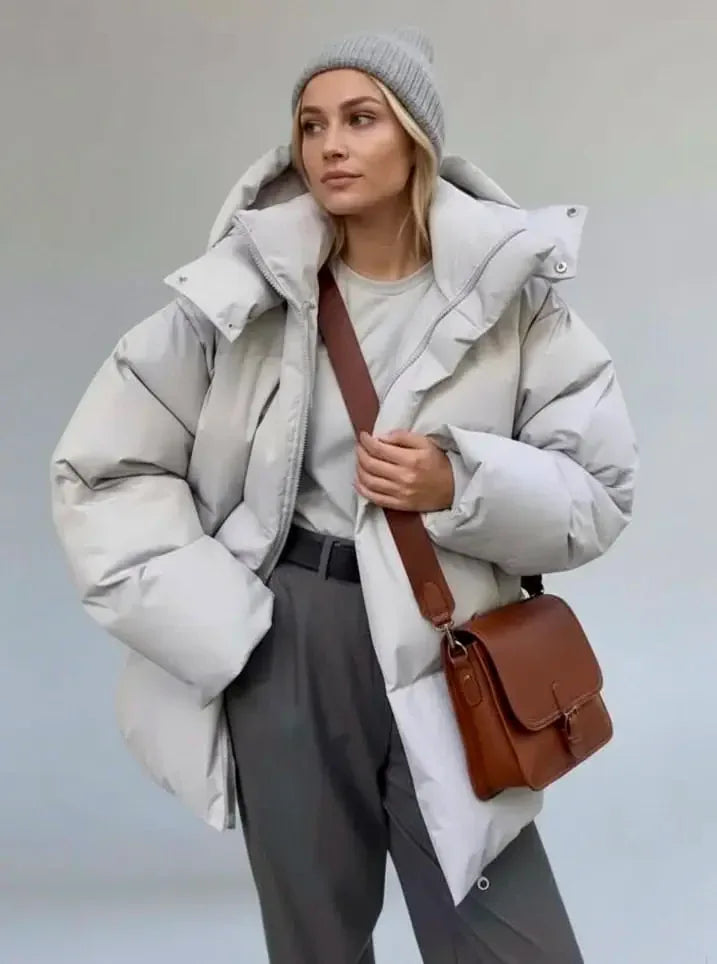 Brown leather crossbody bag with a flap closure and adjustable strap