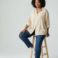 Beige oversized button-down shirt with rolled 3/4 sleeves