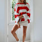 Oversized red white striped knit sweater with ribbed cuffs by Daverri Fashions