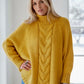 Cozy mustard-yellow oversized cable-knit turtleneck sweater plus size