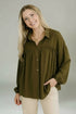 Olive green collared button-down blouse with ruffled neckline and elastic cuffs