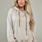 Beige long sleeve hoodie with leopard print drawstrings and ribbed cuffs