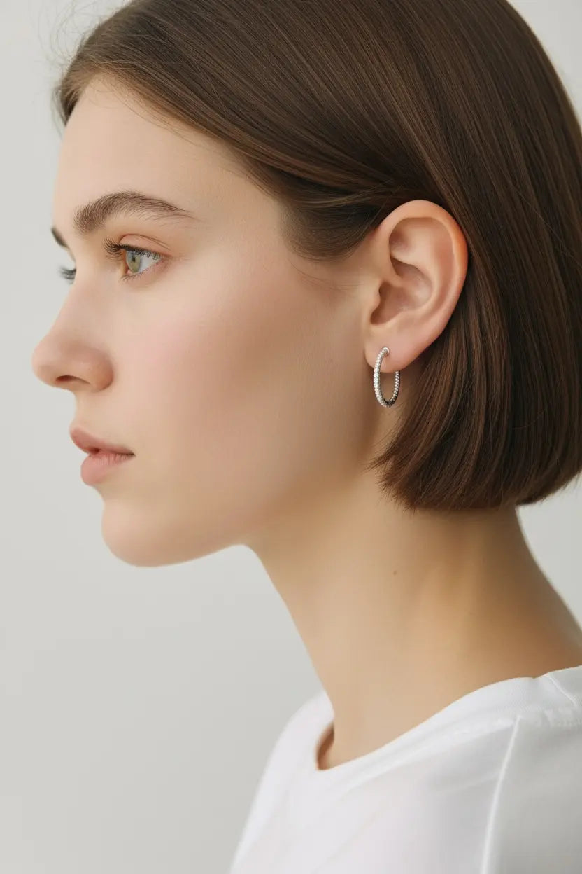 Zircon 925 sterling silver C-hoop earrings with textured surface