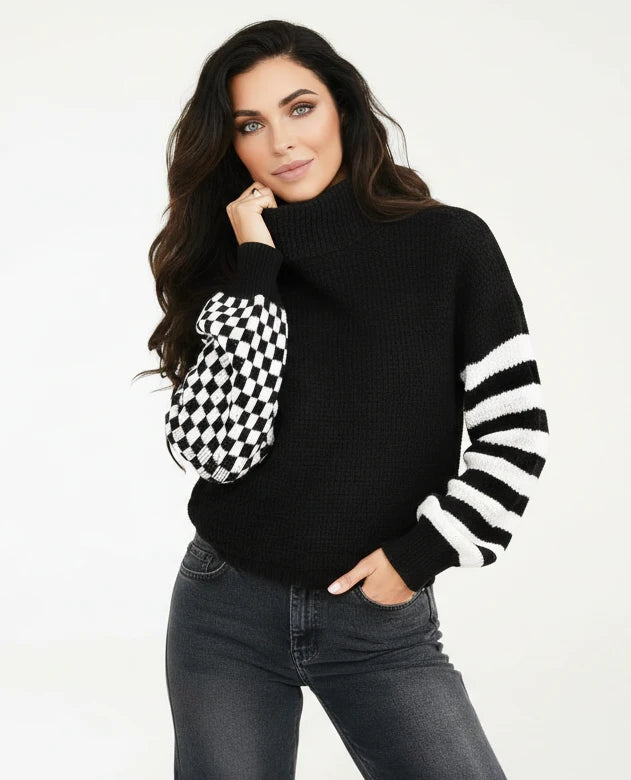 Black turtleneck sweater with checkered and striped sleeves