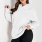 White kangaroo pocket long sleeve hoodie with oversized slouchy fit